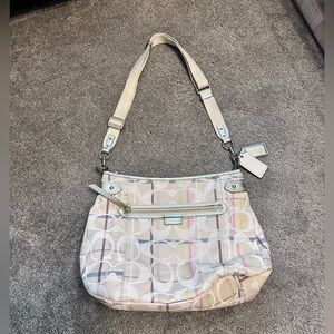 Coach purse with adjustable strap for shoulder to crossbody
